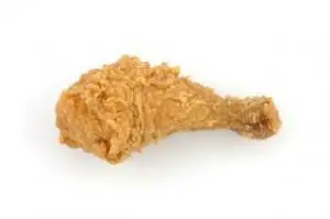 Fried chicken drumstick in isolated white background