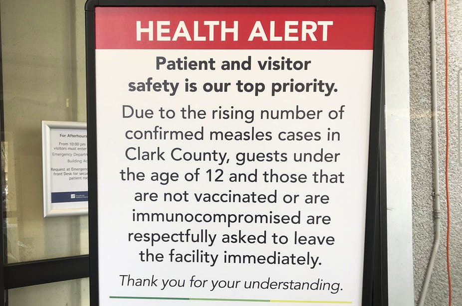 - Health Alert Sign in a Clinic